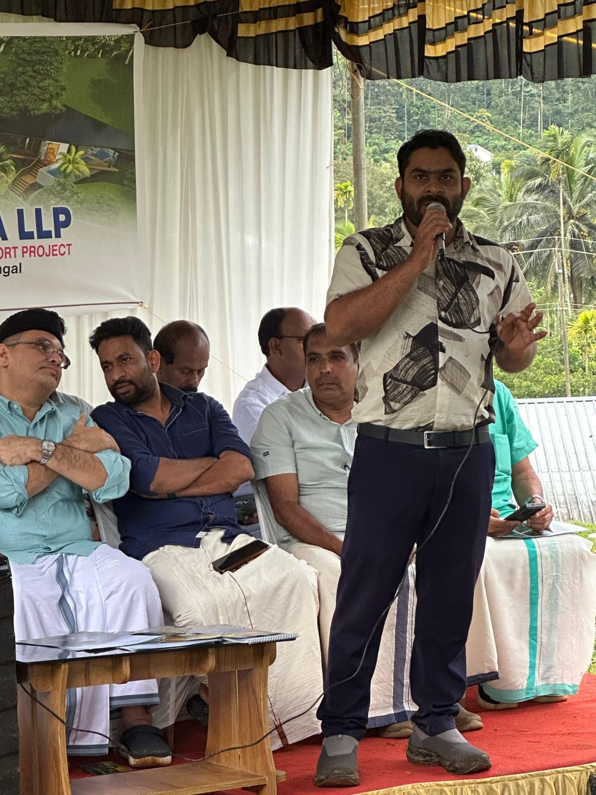 Jeevana MD Muhammed Shahim speaking on stage at Meppadi